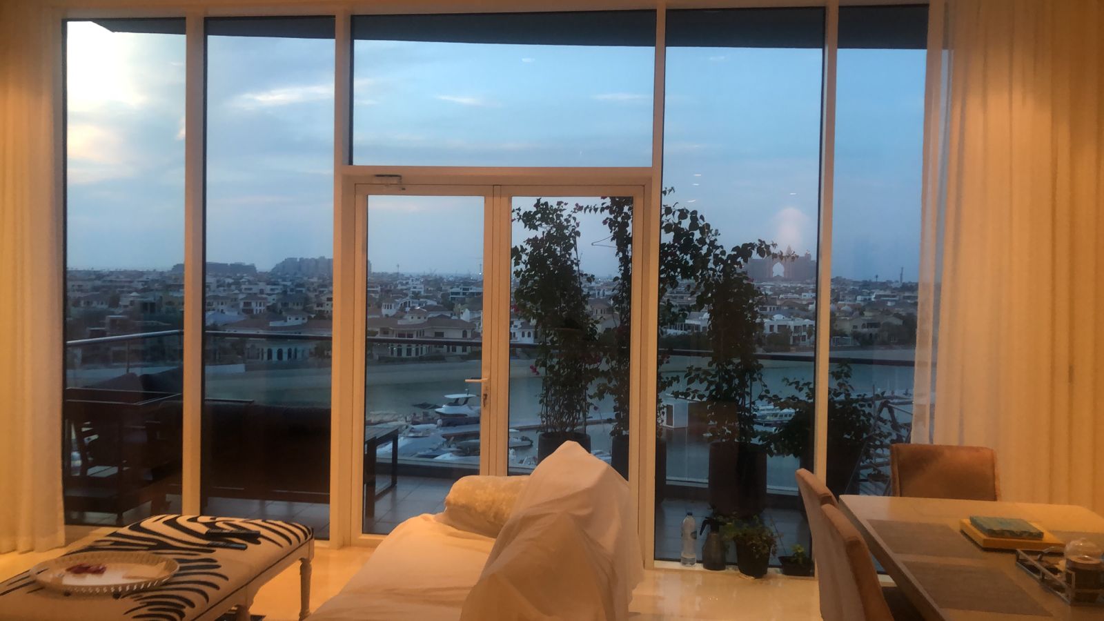 Glass installation Dubai apartment with aluminium windows and balcony door